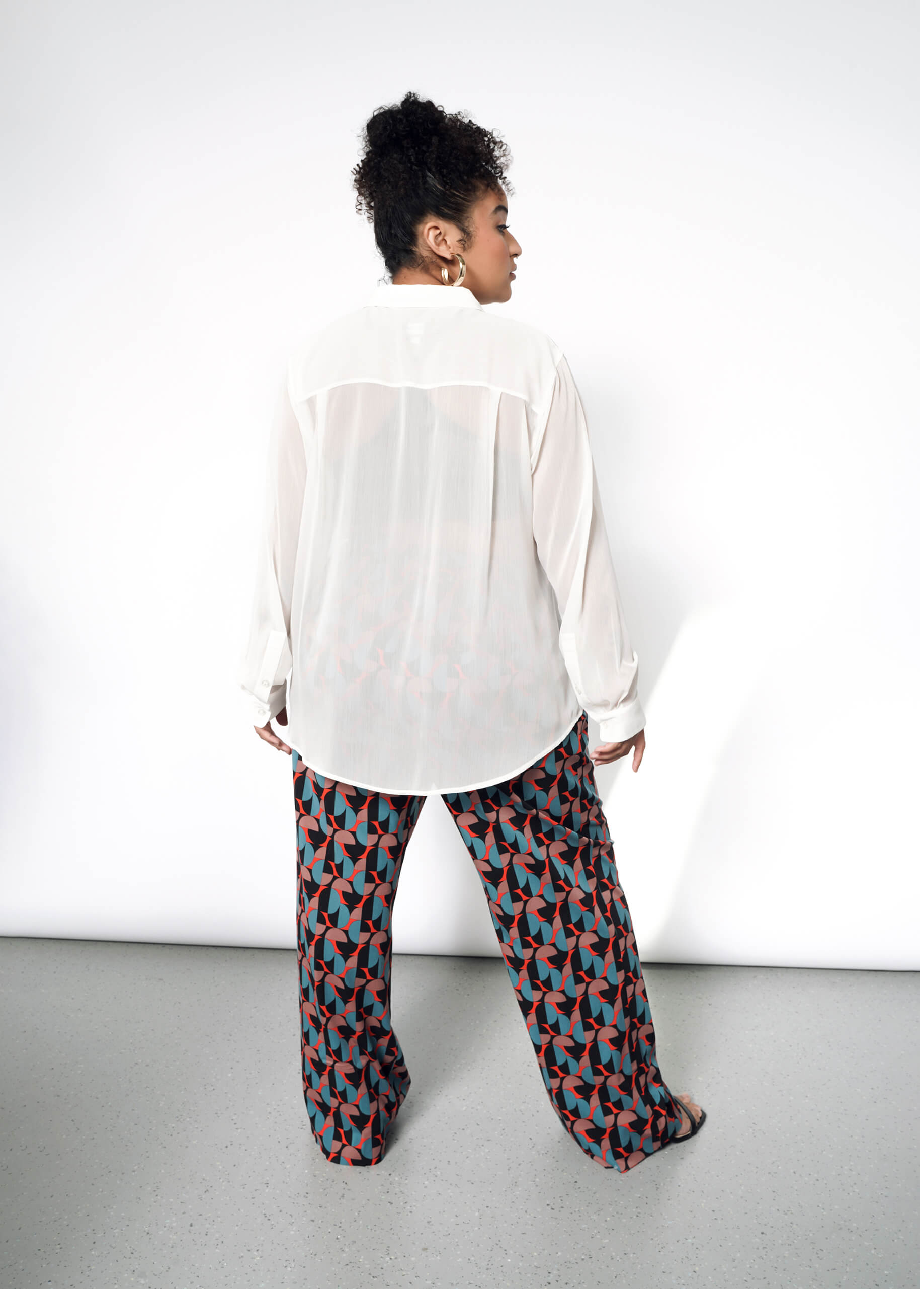 The Empower Sheer Long Sleeve Button Up in White